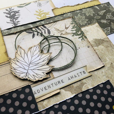 Close up of a scrapbook layout with layered Kaisercraft papers and handmade embellishments